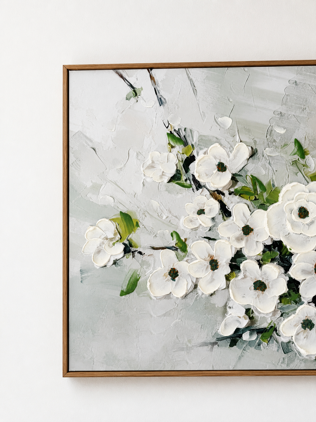 White floral artwork displayed inside Resurrection Spa